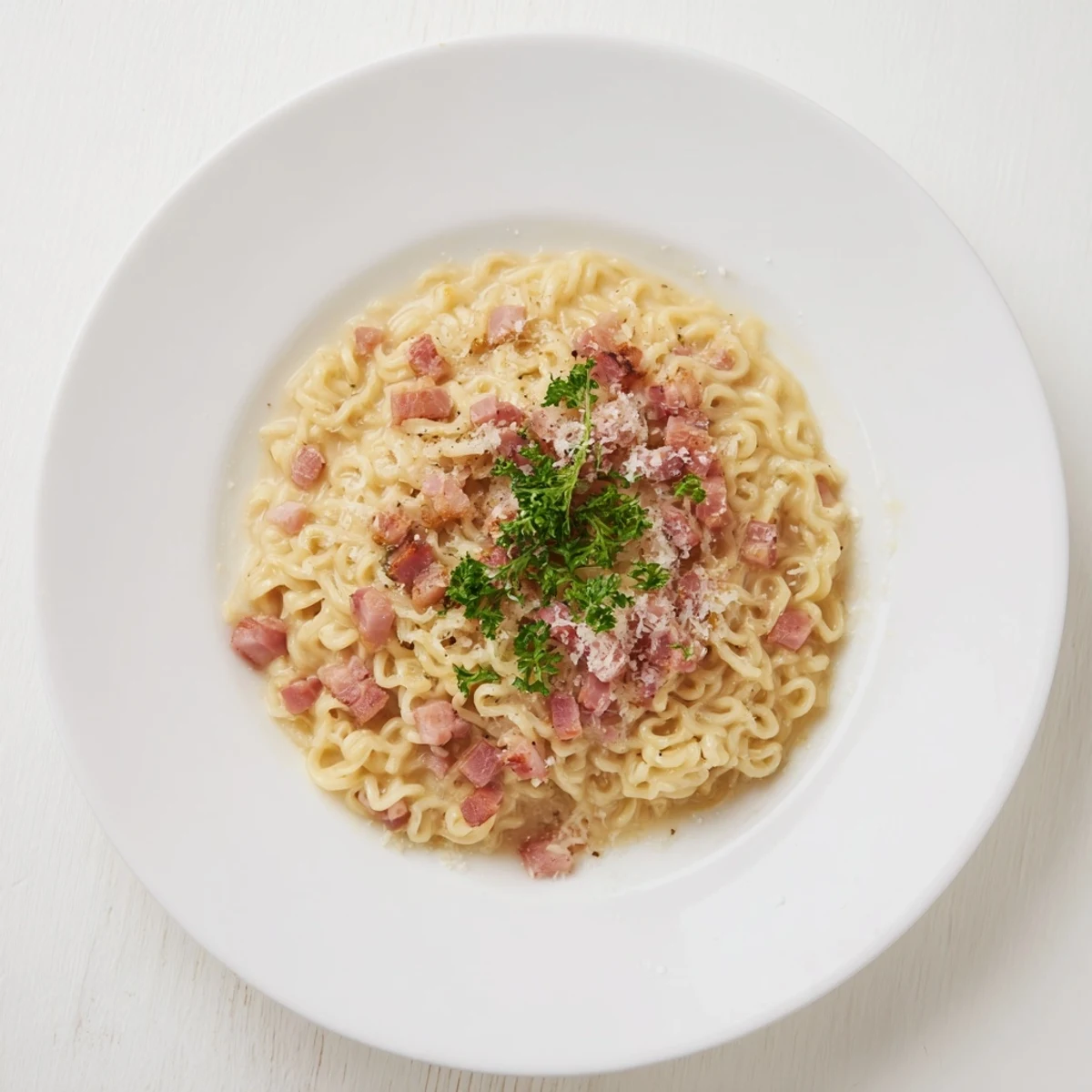 Creamy Carbonara Ramen Fusion: a bowl of cheesy noodles with bacon, a quick, simple meal.