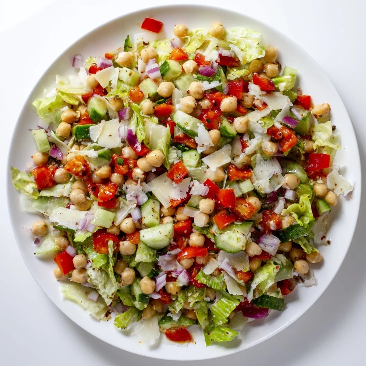 A bright, refreshing bowl of ready-to-eat La Scala chopped chickpea salad, full of flavorful ingredients.
