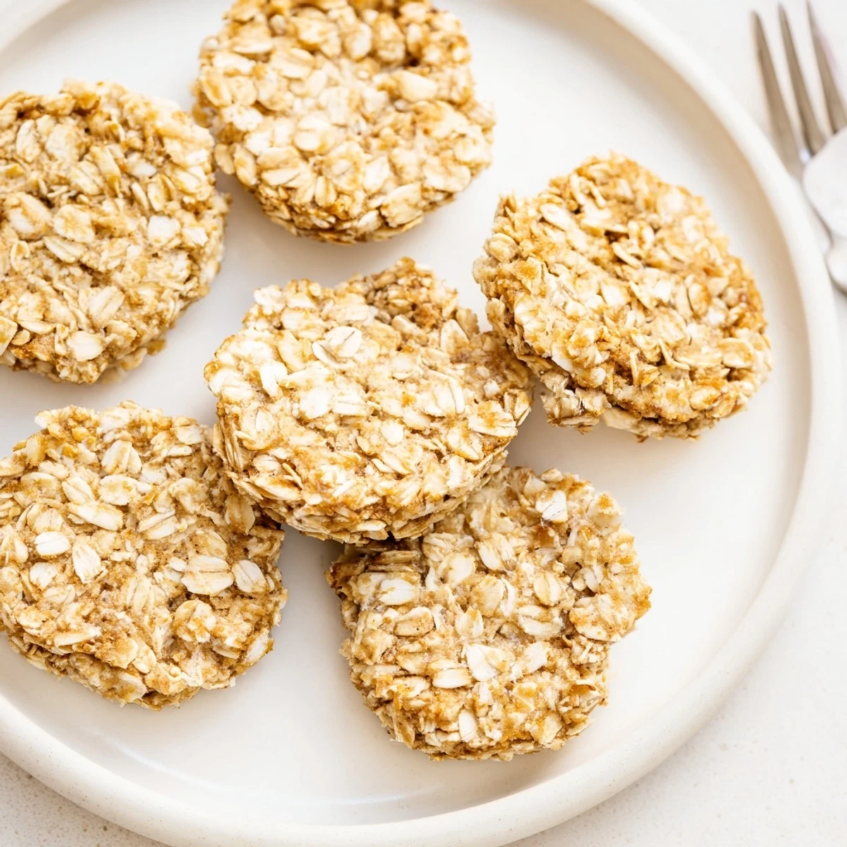 Freshly made Pawsitively Good Dog Bone Treats with a bone-shaped cookie cutter and ready for your dog.