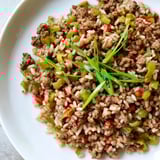 Close-up photo of flavorful Cajun Dirty Rice, smelling of herbs, perfect for dinner tonight.