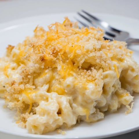 Creamy Classic Baked Macaroni and Cheese topped with golden panko and cheddar.  