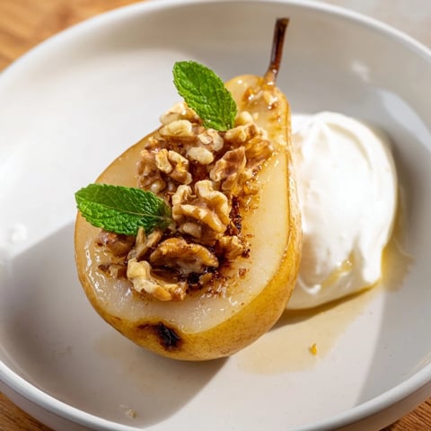 Golden roasted pears with cinnamon, walnuts, and Greek yogurt, a healthy dessert ready to eat.