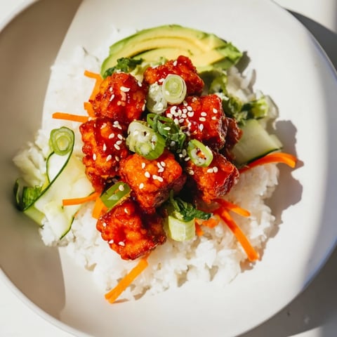 Golden, crispy Chili-Mayo Baked Tofu Bowls: imagine tender tofu covered in spicy, creamy sauce.
