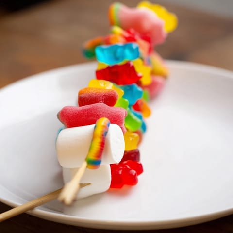 Close-up of a festive gummy candy kabobs display, ready to enjoy at the next celebration or party.