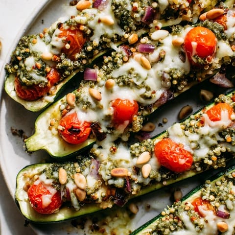 Cheesy Pesto Zucchini Boats