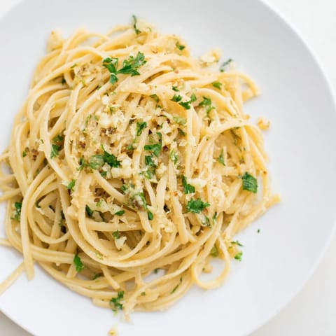Golden, garlic-infused butter coats each strand of linguine in this easy weeknight meal.