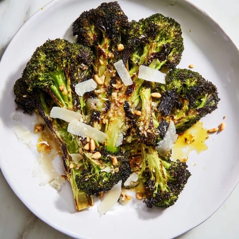 This vibrant charred broccoli salad features tender broccoli florets, Parmesan, and a bright lemon dressing.