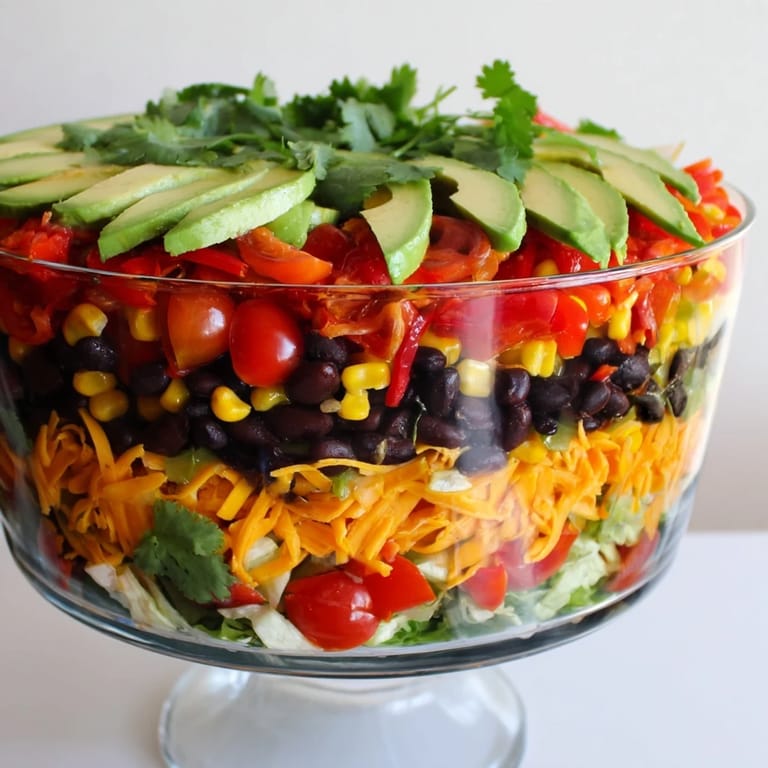 Vibrant Southwest Sunset Palette salad showcases the sunset hues with visible black beans and fresh cilantro.