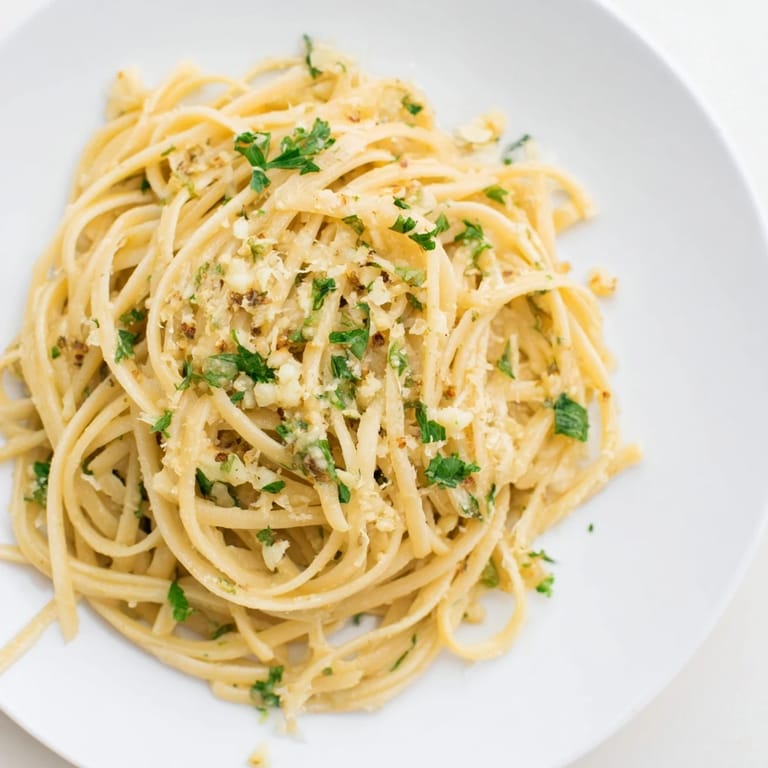 Golden, garlic-infused butter coats each strand of linguine in this easy weeknight meal.